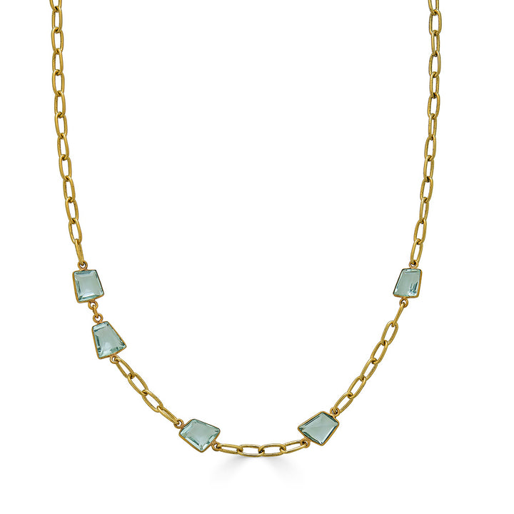 A paperclip chain with fancy cut asymmetrical quartz crystals