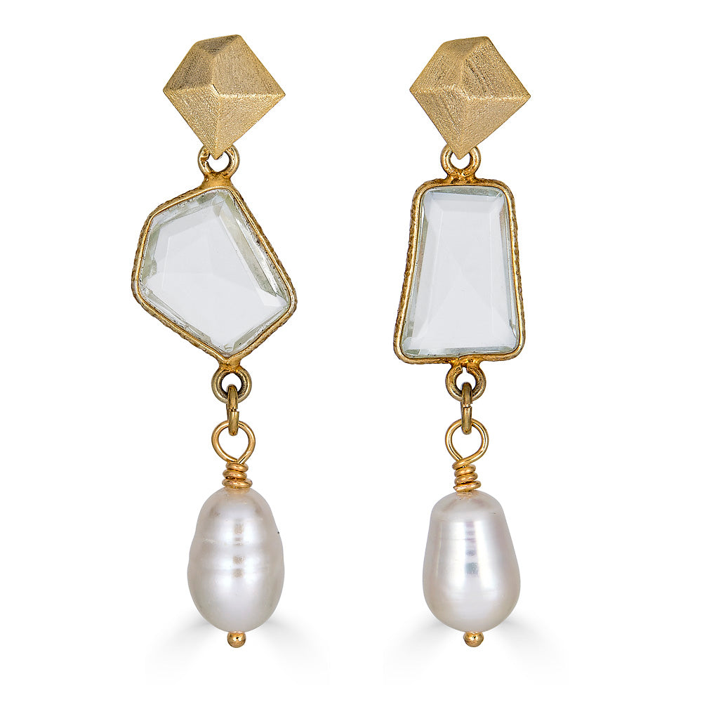 an asymmetrical quartz earring with a pearl dangle