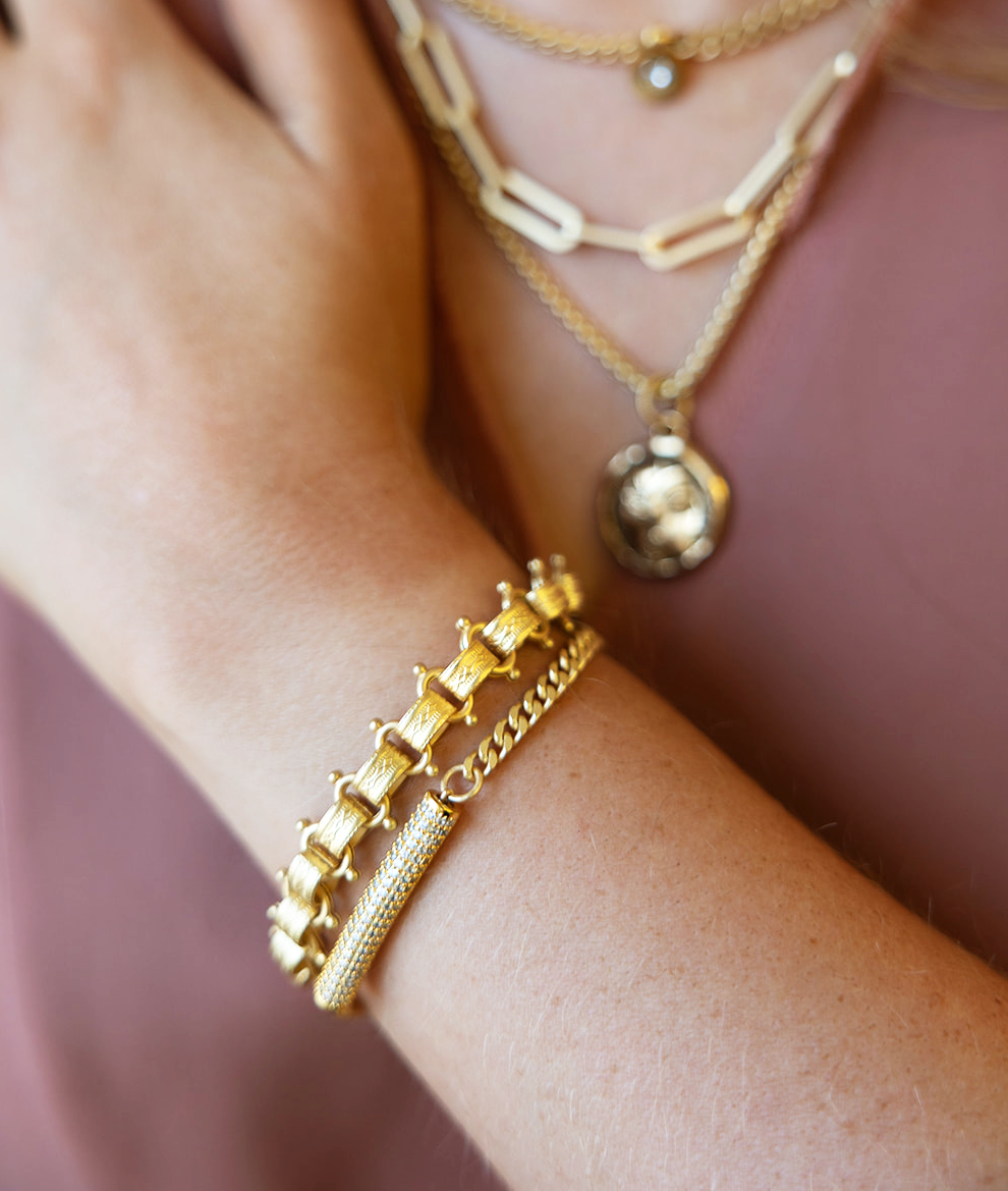 A vintage inspired bookchain bracelet with a magnetic clasp