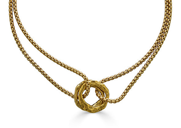 a matte gold two strand necklace with two hammered circles