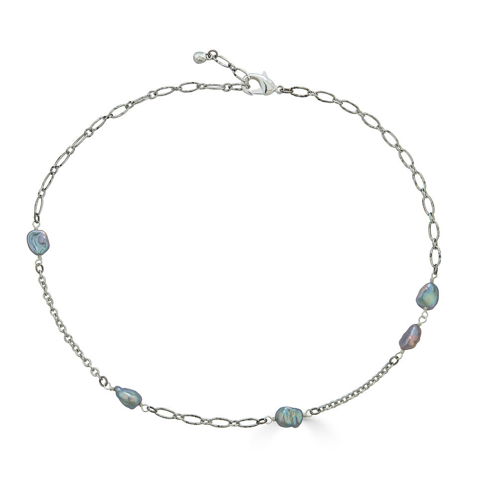 Rhodium-plated chain necklace featuring five gray keshi pearls spaced along the chain, shown in a circle on a white background.