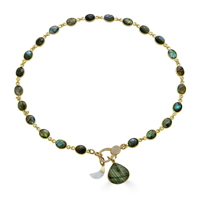 a labradorite necklace with a heart shaped labradorite pendant and a moonstone moon with a pave clasp
