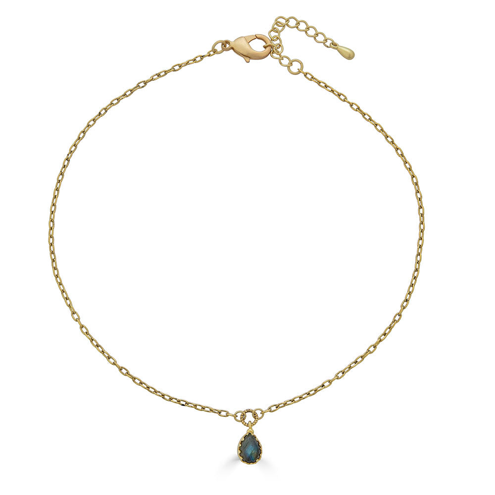 Gold chain necklace with a faceted teardrop labradorite pendant in a prong setting