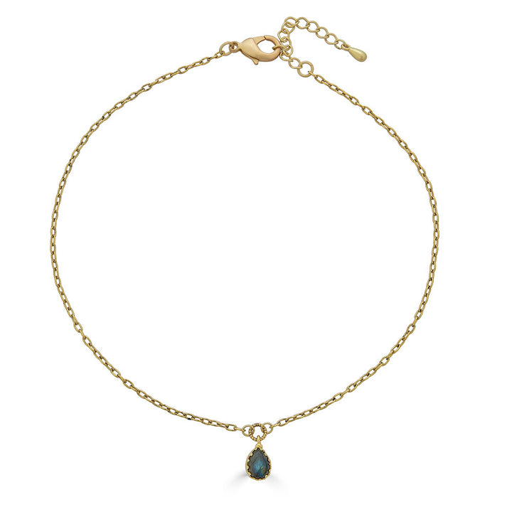 Gold chain necklace with a faceted teardrop labradorite pendant in a prong setting