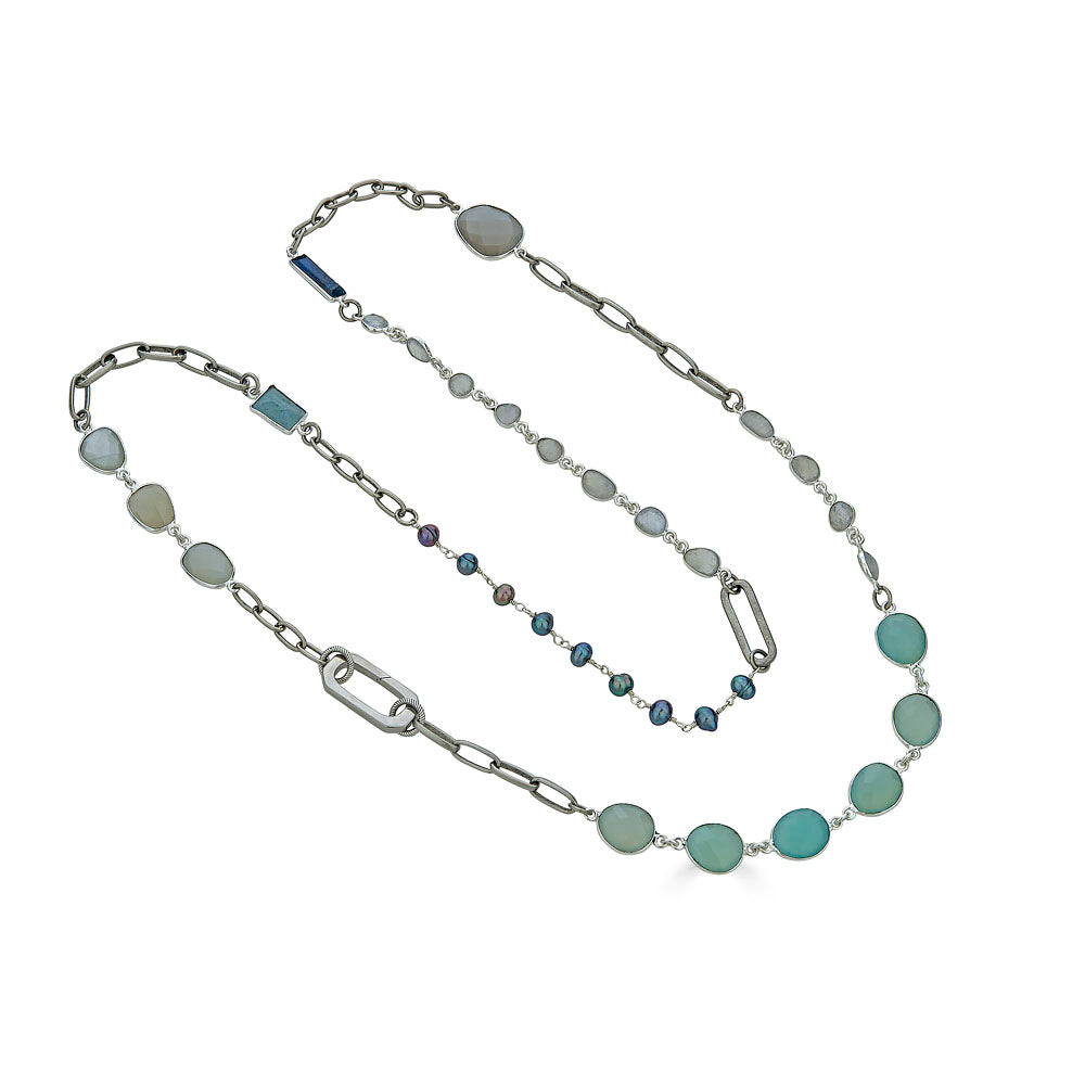 A silver mixed gemstone necklace with chalcedony, kyanite, moonstone and pearls.