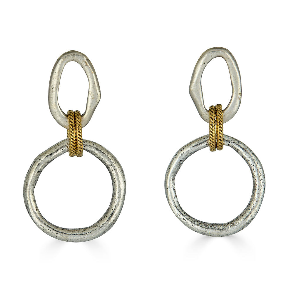 Mixed metal earrings with silver sculpted circles, soft gold oval tops, and rope-textured gold connector rings.