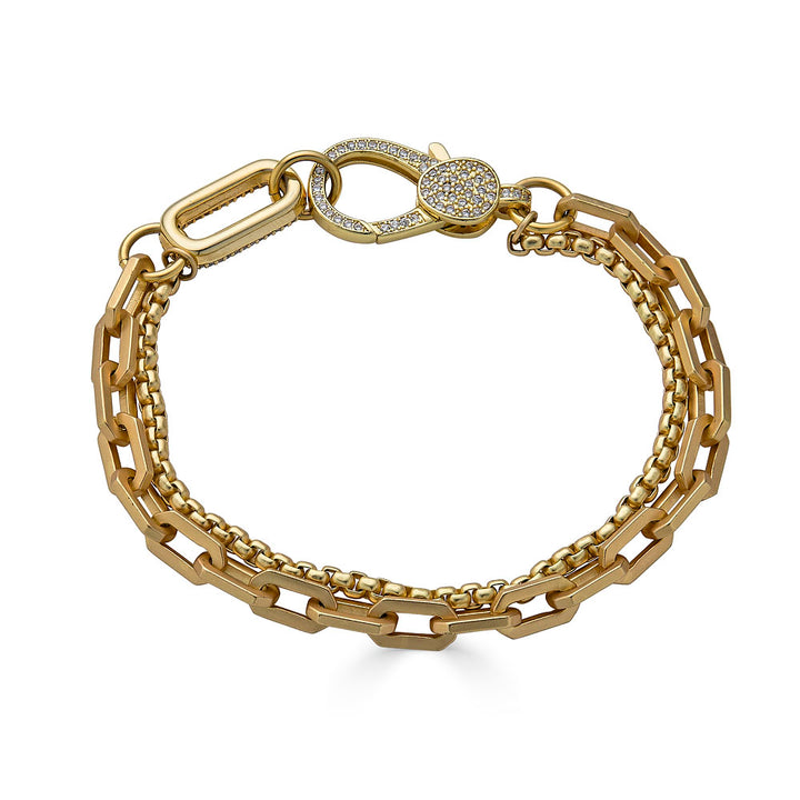 Sleek gold bracelet with pavé clasp and mixed chains. The Pavé Connector Bracelet is bold, modern, and stackable — perfect on its own or layered.
