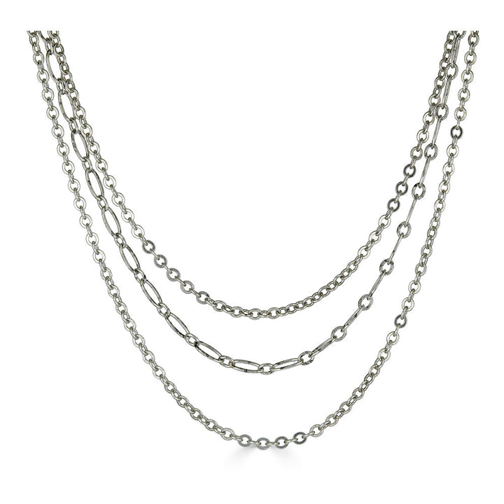 Silver-colored three-strand necklace with delicate mixed chain styles and adjustable clasp