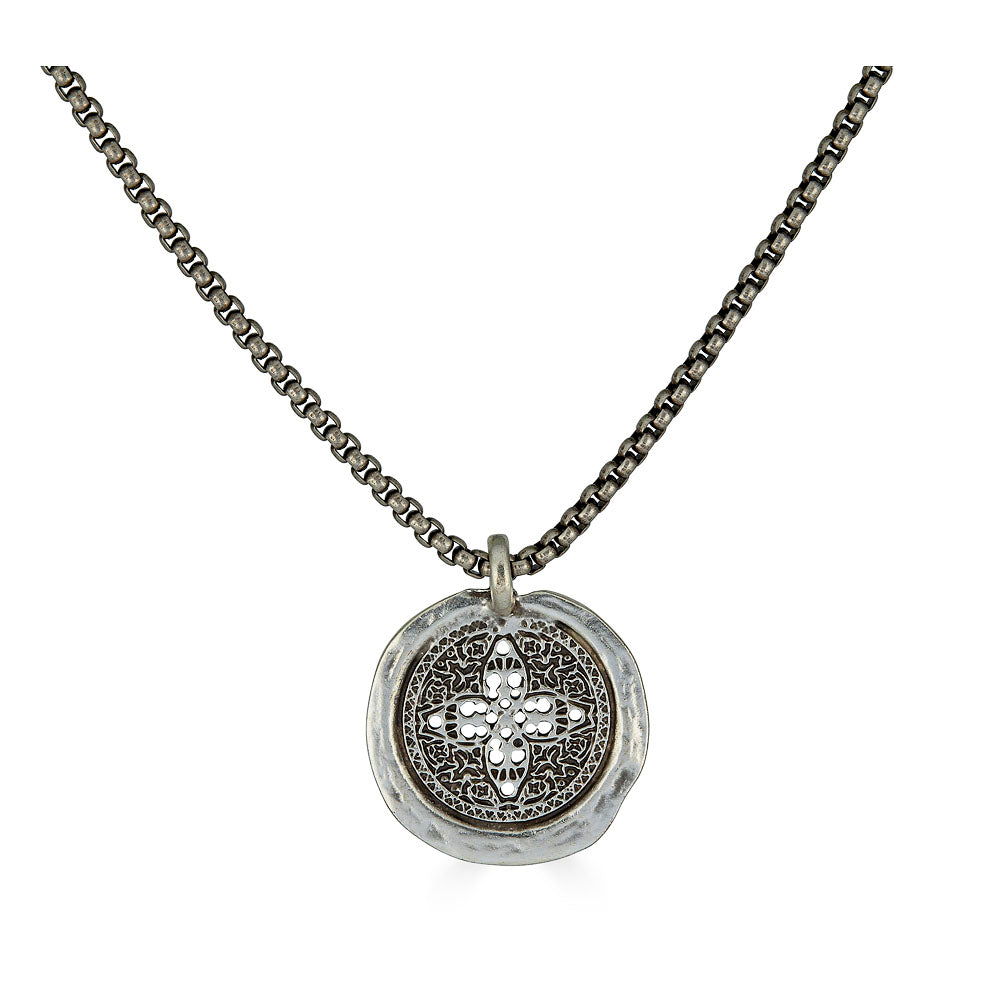 Antique silver necklace with round filigree coin pendant and rounded box chain.