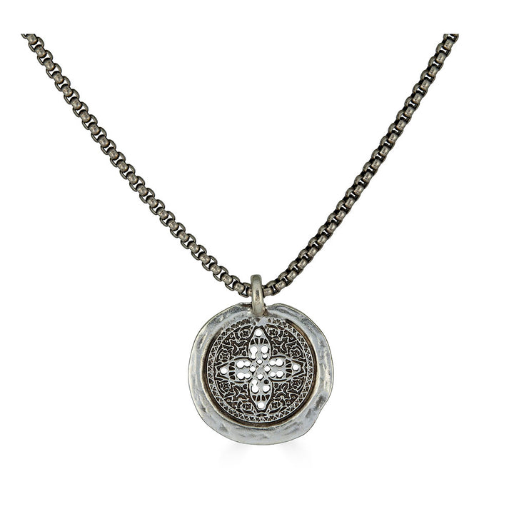 Antique silver necklace with round filigree coin pendant and rounded box chain.