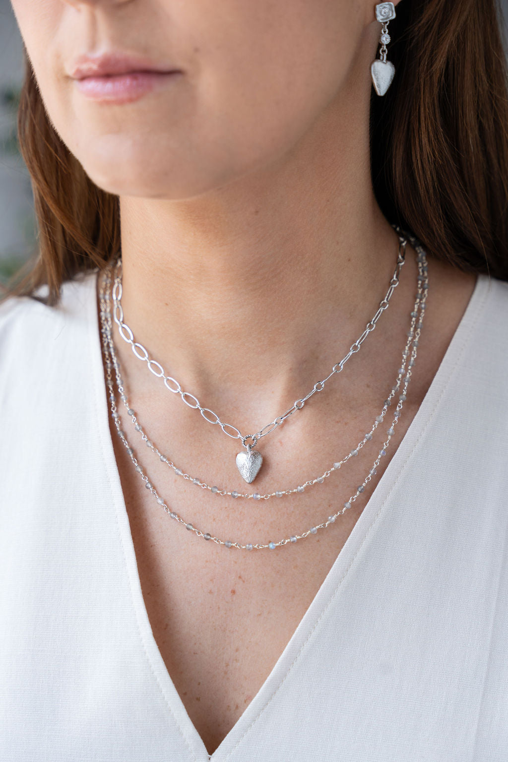 Two-strand silver chain necklace with faceted labradorite beads and adjustable clasp