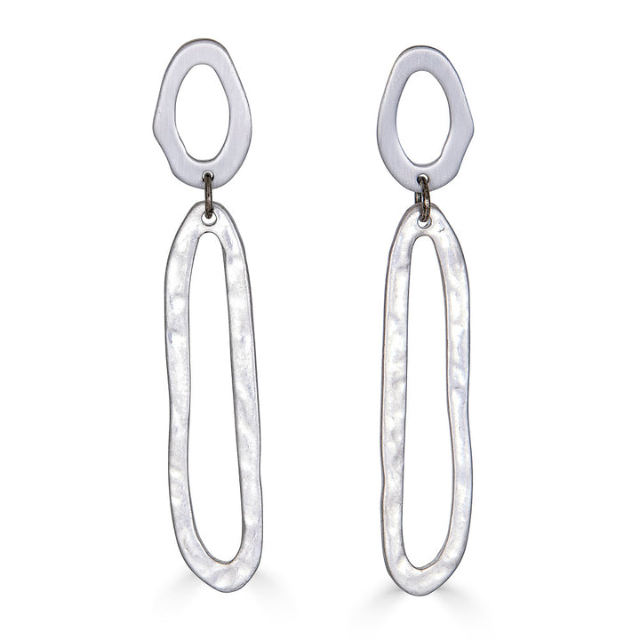 A silver swirl dangle earring with oval cutout post.