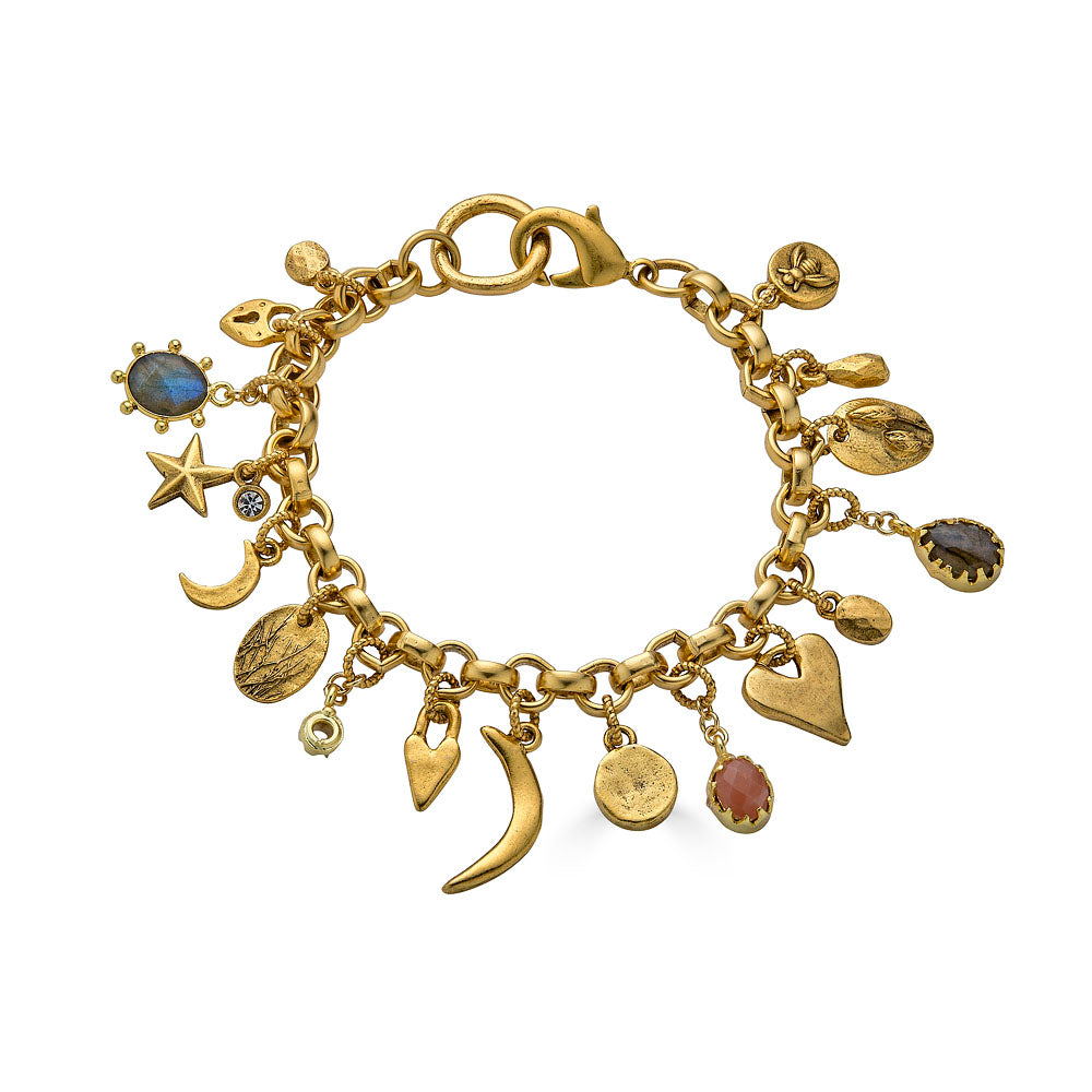 Gold charm bracelet with an eclectic mix of heart, moon, star, and gemstone charms on a chunky chain.
