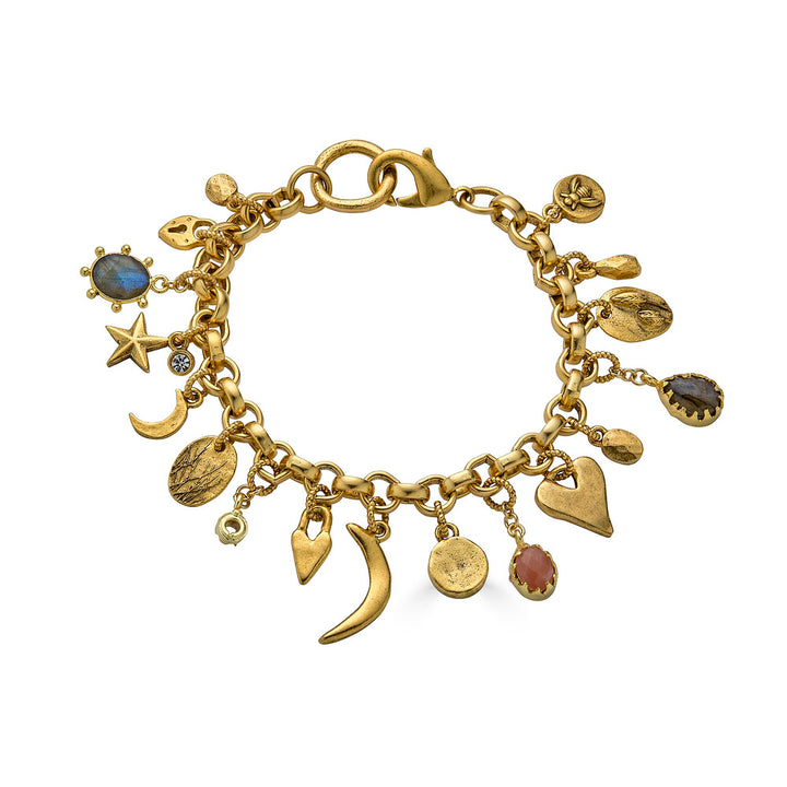 Gold charm bracelet with an eclectic mix of heart, moon, star, and gemstone charms on a chunky chain.