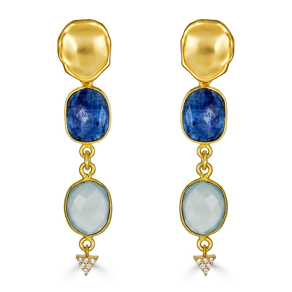 a pair of earring with bezel set kyanite and aquamarine stones on a lotus leaf post