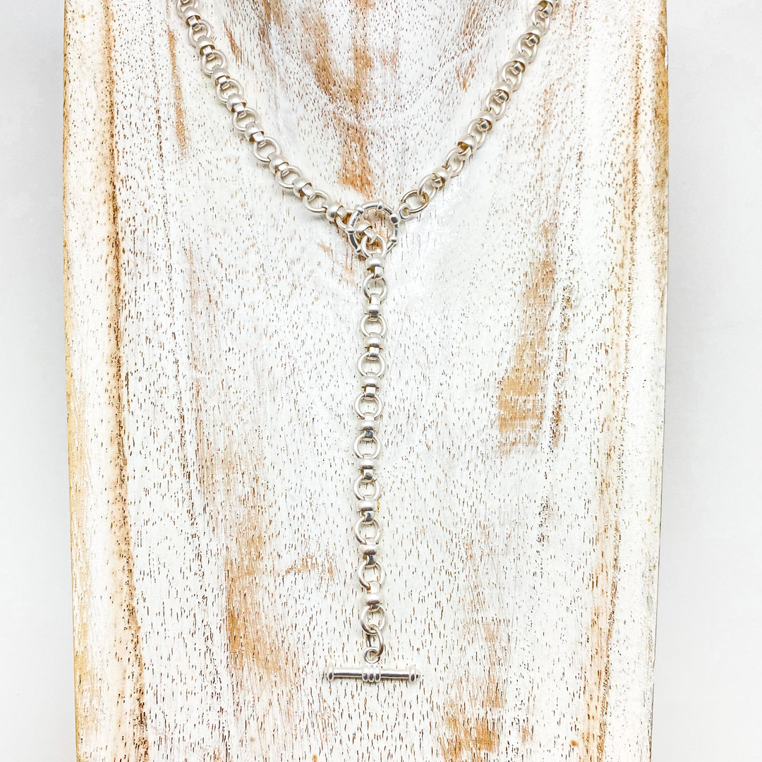 A matte silver mariner chain lariat necklace and bracelet.