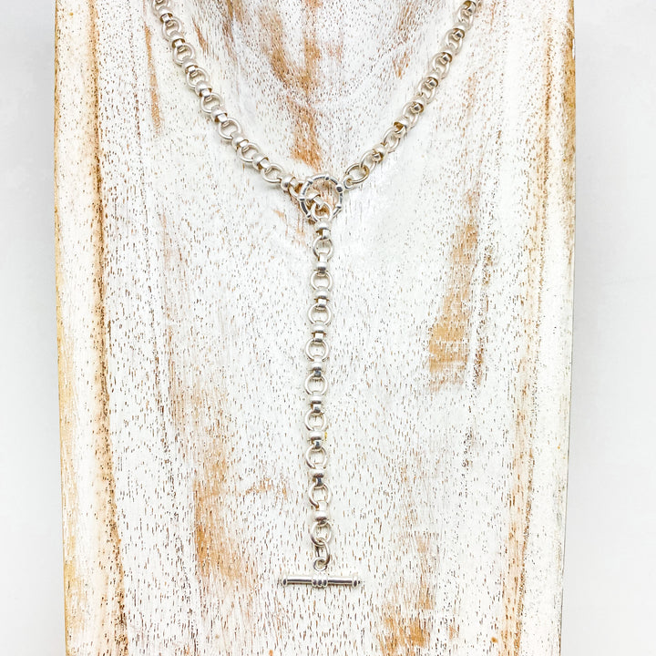 A matte silver mariner chain lariat necklace and bracelet.