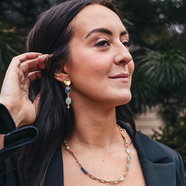 a short mixed gemstone necklace with kyanite, moonstone, aquamarine and pearls