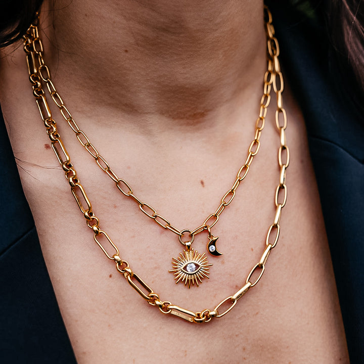 A gold mixed link layering chain
