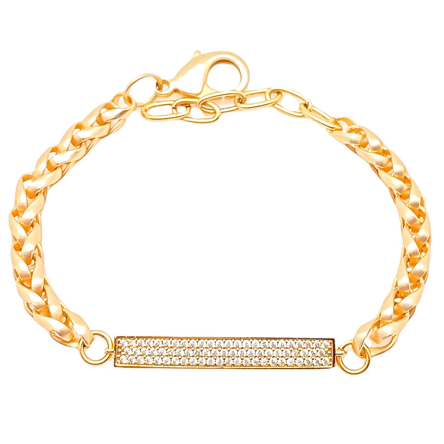 A matte gold chainlink bracelet with pave bar connector.
