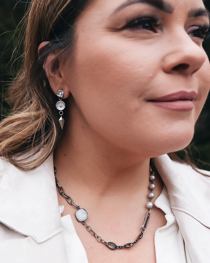 a mixed gemstone necklace with labradorite, pearls and moonstone