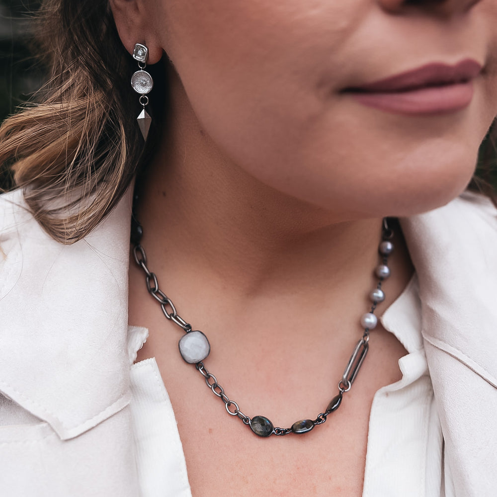 a mixed gemstone necklace with labradorite, pearls and moonstone