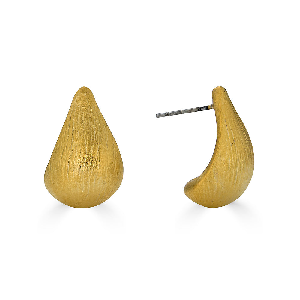 A pair of matte gold tear drop earrings.