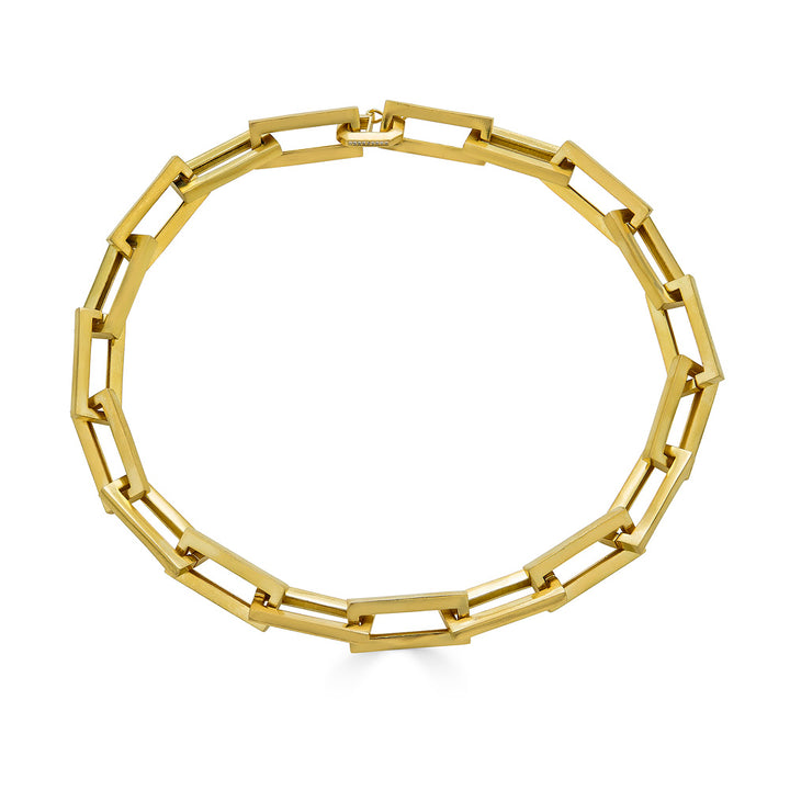 A gold chunky rectangle link necklace with a pave clasp.