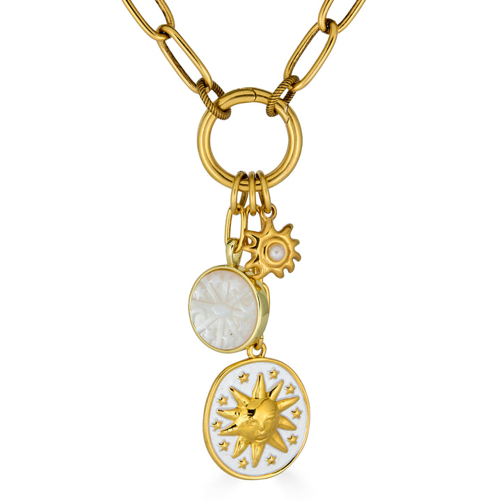 Gold paperclip chain necklace with enamel celestial charms, mother-of-pearl detail, and a sun medallion pendant.