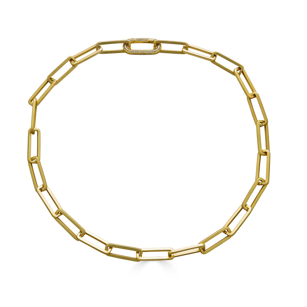A matte gold chunky rectangle chain necklace with oval pave clasp.