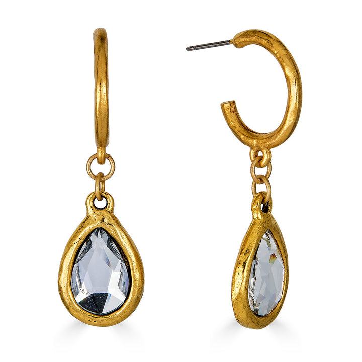 A pair of gold teardrop crystal hoop earrings.
