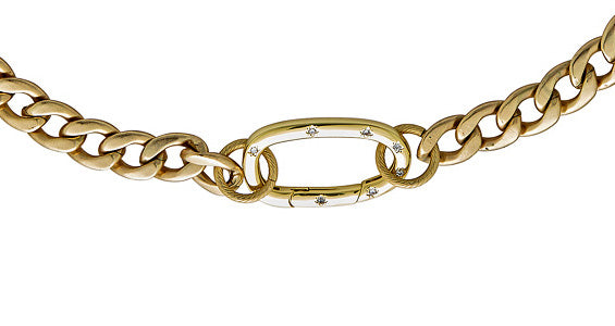 a matte gold curb chain necklace with oval pave clasp