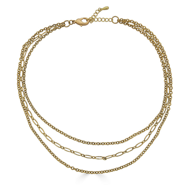 Gold three-strand necklace featuring delicate mixed chain styles and adjustable clasp