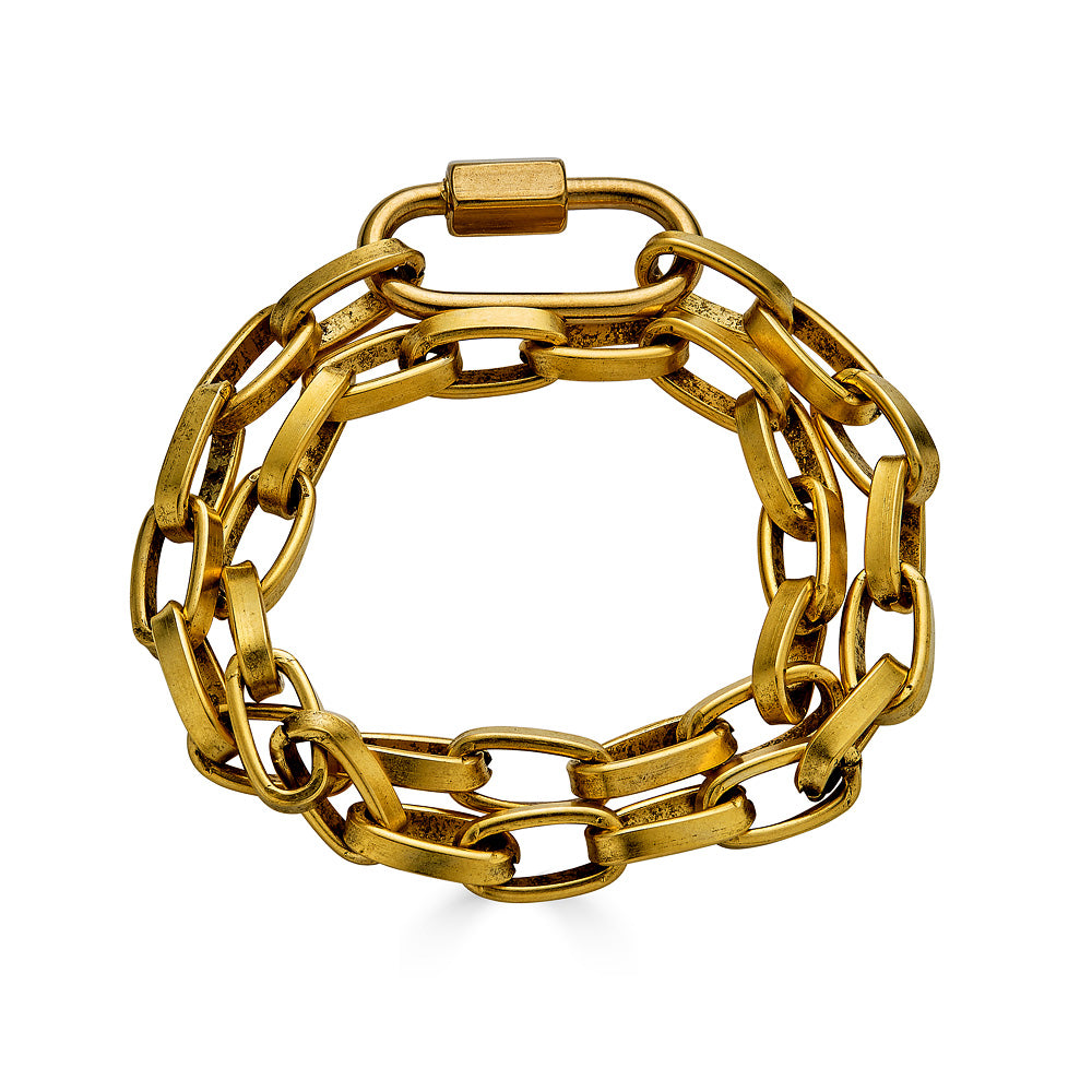 A chunky gold paperclip double wrap bracelet-necklace with carabiner link.
