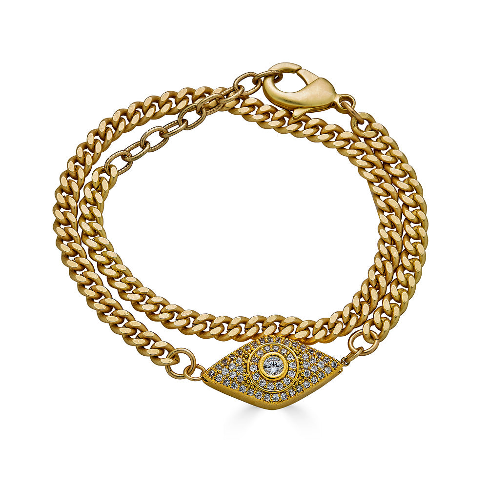 A matte gold double wrap bracelet with a pave third eye
