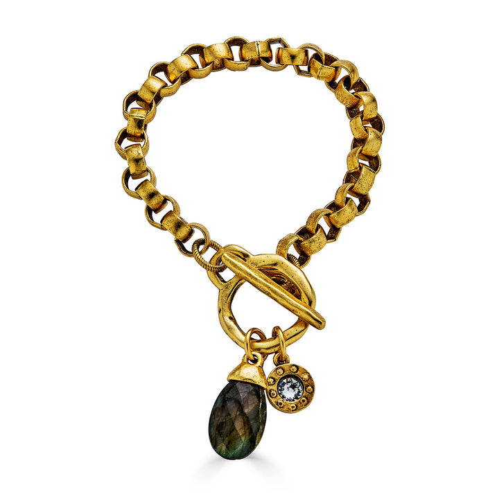 A gold chunky rolo chain bracelet with a labradorite charm and toggle clasp.