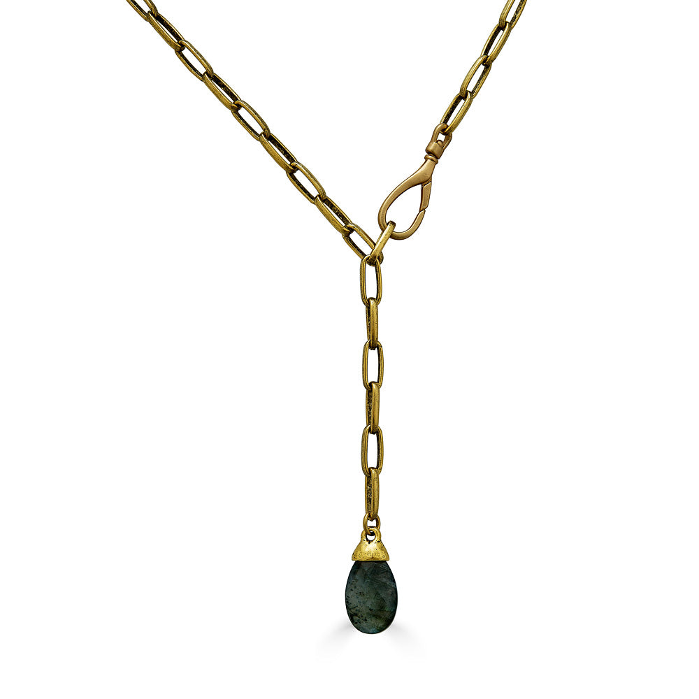 A gold lariat and labradorite pendant necklace.