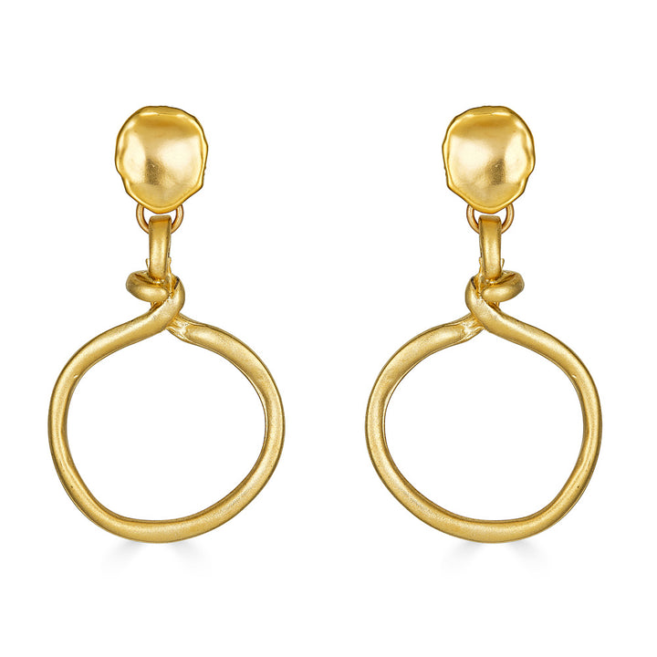 A matte gold dangle earring with a rope lasso detail