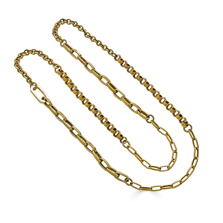 A gold four chain layering necklace.