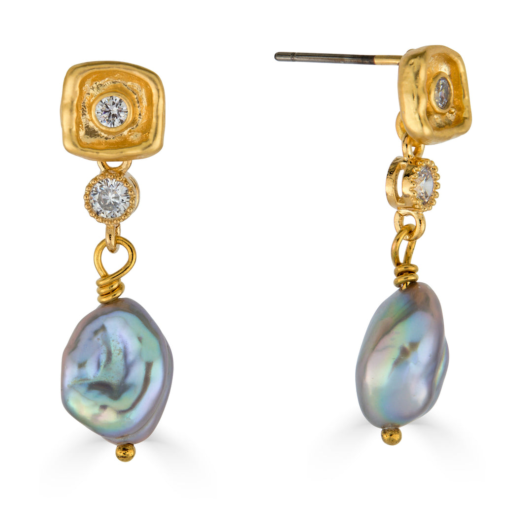 Gold drop earrings with iridescent gray keshi pearl drops and crystal accent details.