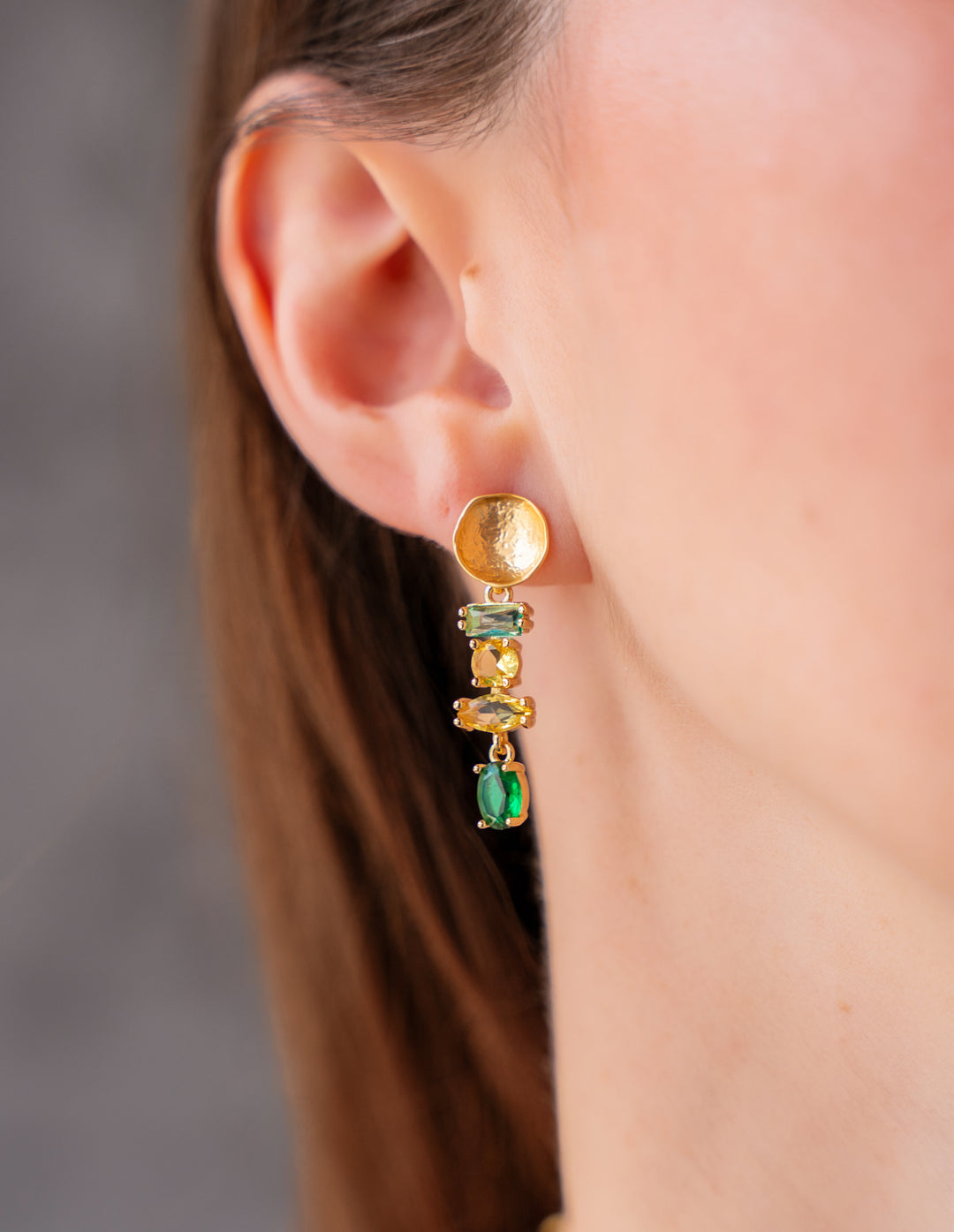 Green and yellow multi gemstone drop earrings with hammered gold stud tops.