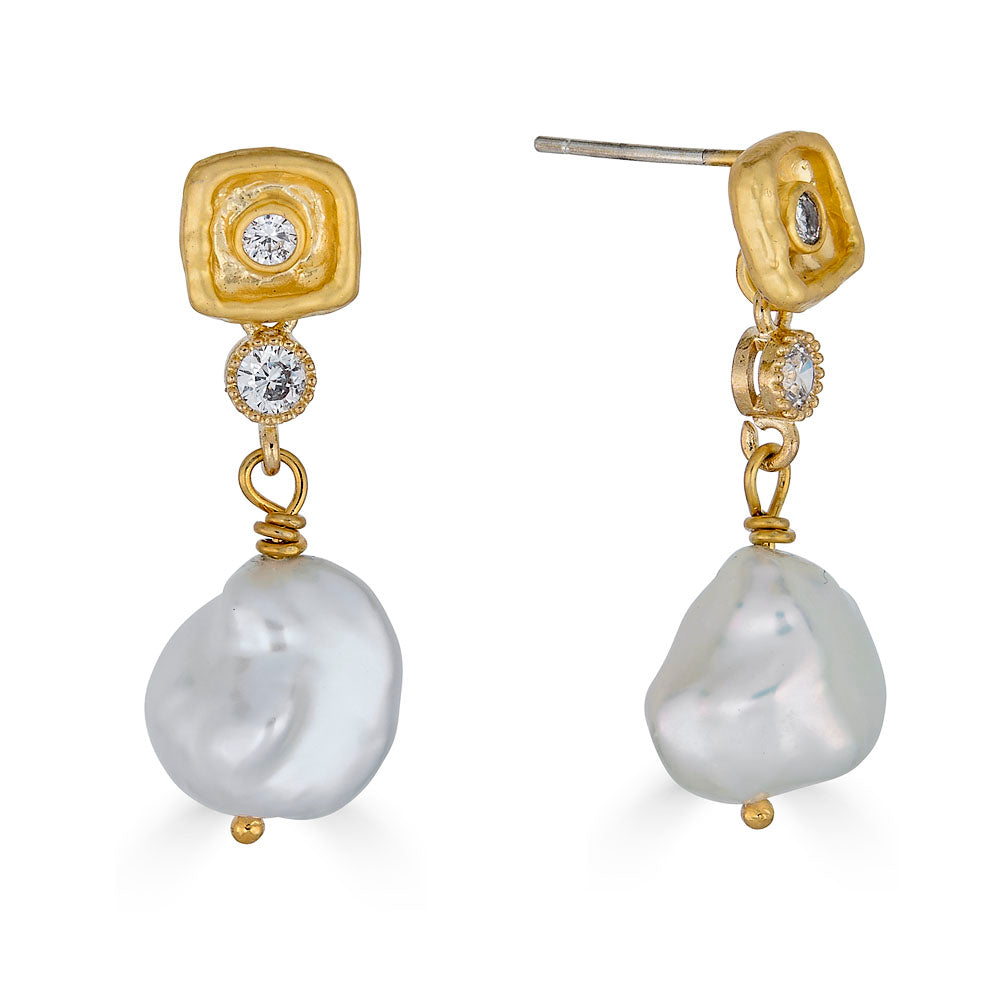 Gold drop earrings with unique Keshi pearls and two crystal accents on a textured post