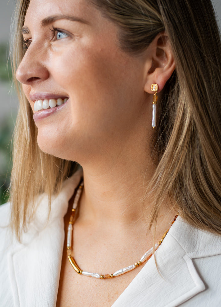 Drop earrings with Biwa pearls, hessonite garnet cubes, and gold accents