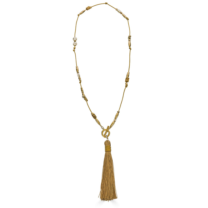 Handmade gold tassel necklace with organic bead accents and silk tassel detail