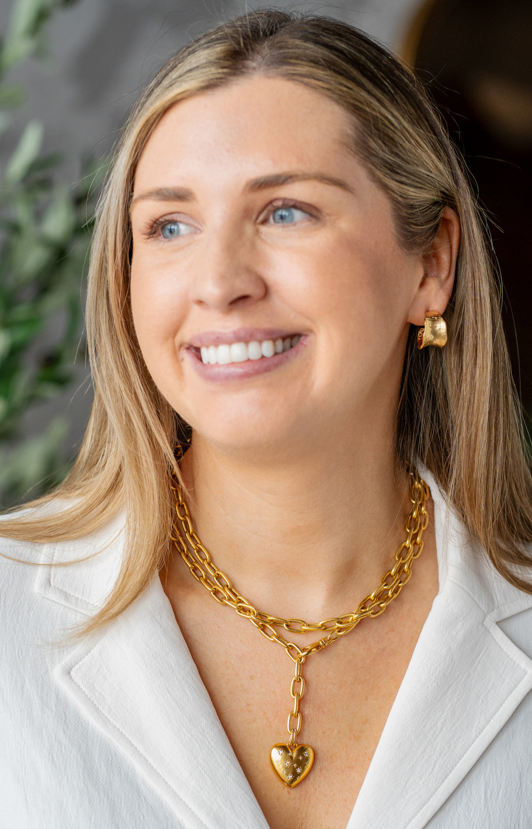 Long Heart Necklace with gold chain and heart charm, shown doubled and wrapped, handmade by Loni Paul Jewelry.