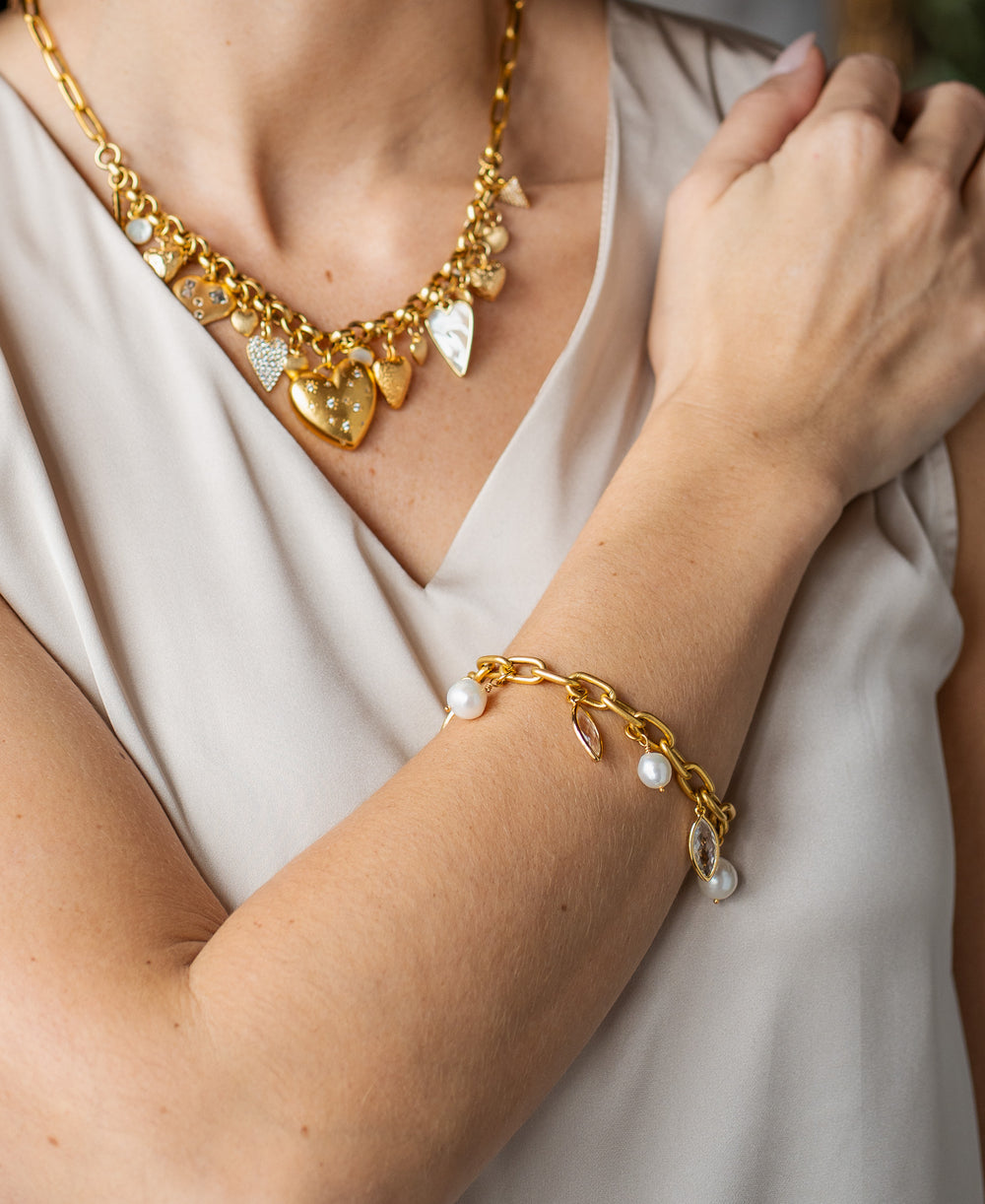 Gold chain bracelet with Edison pearl and marquise-cut crystal charms, alternating along a chunky link design