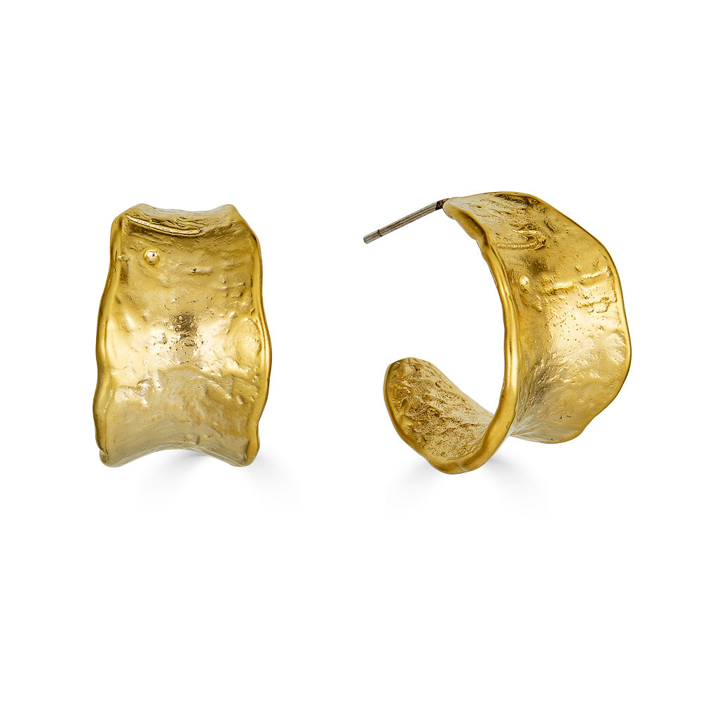 A pair of matte gold post hoop earrings with irregular shape and texture.