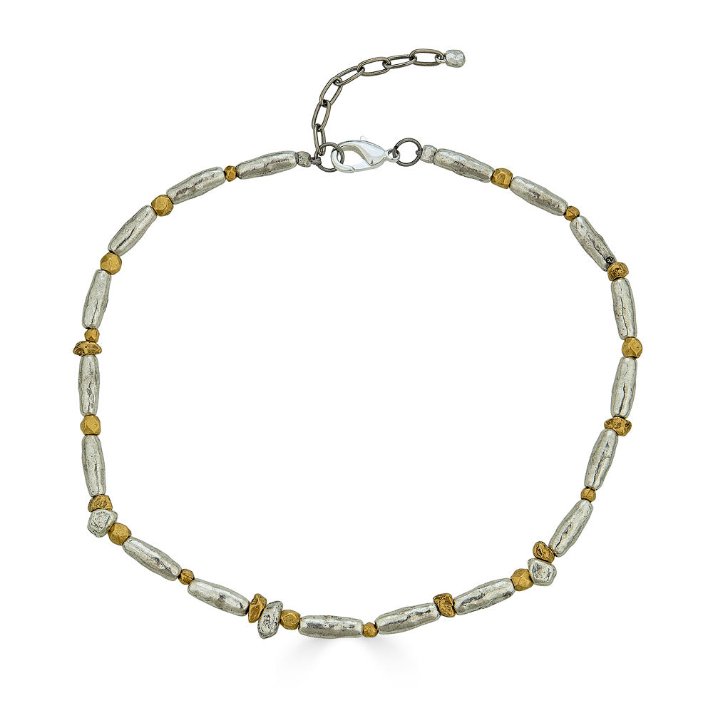 Mixed metal necklace with organic gold and silver-toned beads, shown in full circle.
