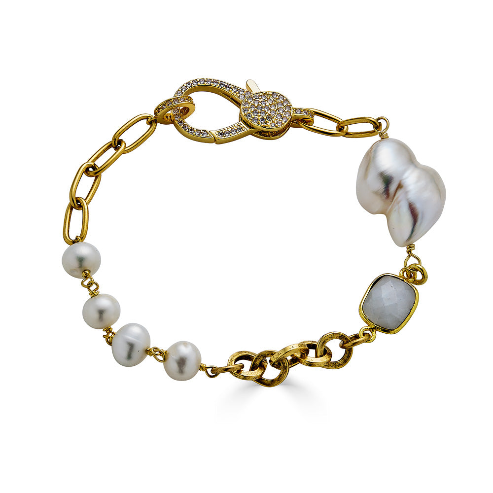 A mixed chain bracelet with baroque pearls and moonstone and a pave clasp.