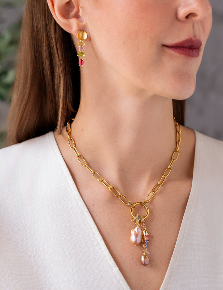 Pink and green multi gemstone drop earrings with hammered gold stud tops and faceted colorful stones.